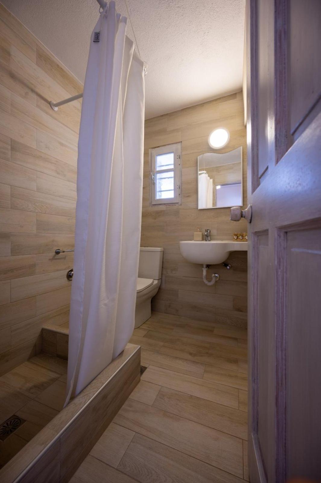 Twins-Trisa Apartments ออร์นอส ภายนอก รูปภาพ